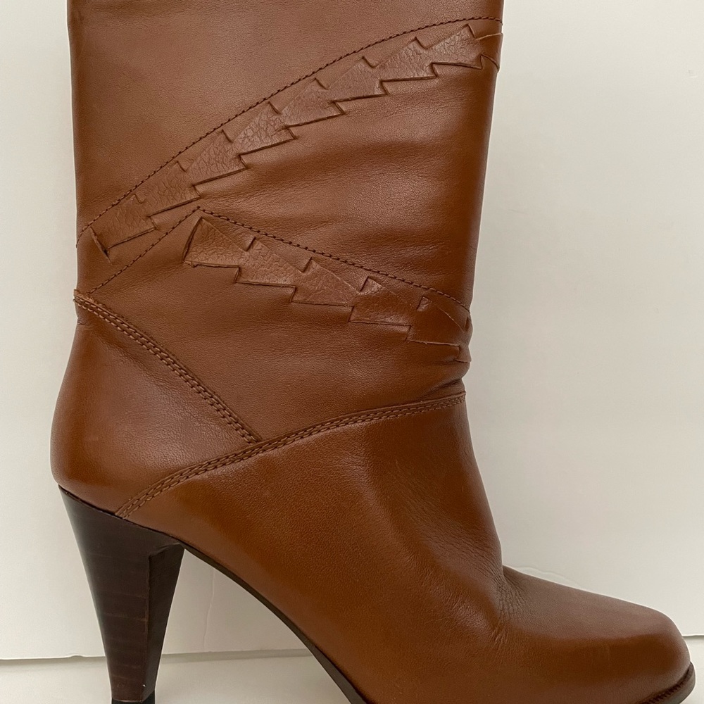 9 West leather 1/2 calf stacked heel 3 1/2 inch boot. Camel color, Size 8.